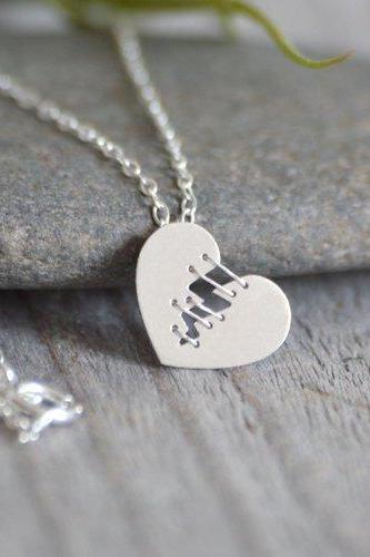 Mended Heart Necklace With Silver Sutures, Handmade In The UK